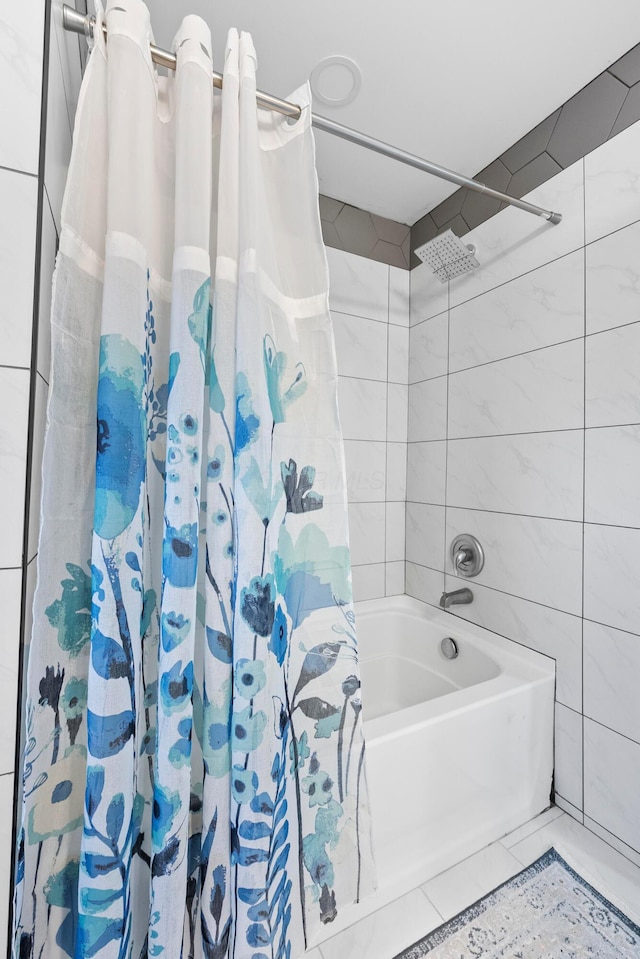 full bathroom featuring shower / tub combo with curtain