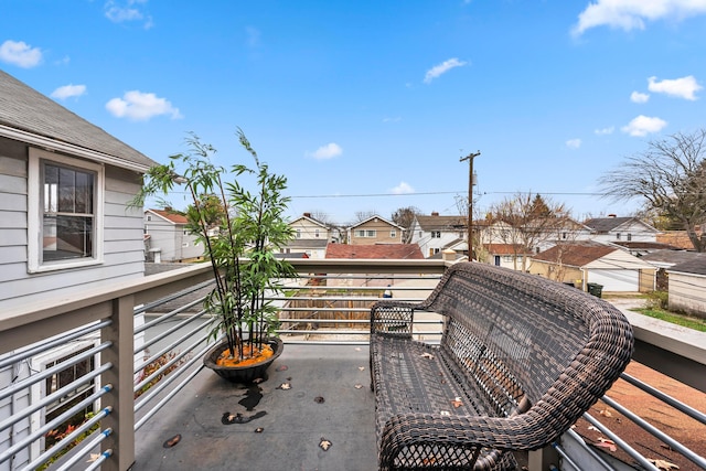 view of patio / terrace featuring a balcony and a residential view