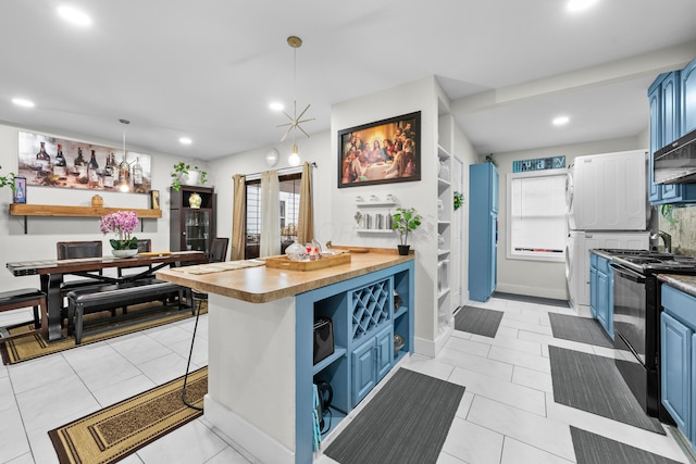 kitchen featuring blue cabinetry, black appliances, recessed lighting, hanging light fixtures, and light tile patterned flooring