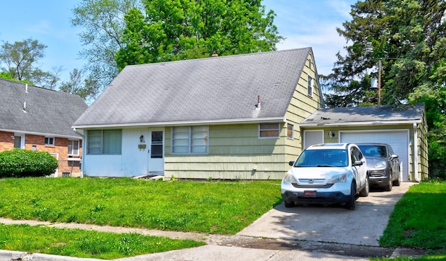 1934 Stratford Way, Columbus, OH 43219 - view of front facade with concrete driveway, a garage, a front lawn, and roof with shingles