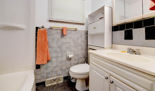 1934 Stratford Way, Columbus, OH 43219 - full bath with tile walls, toilet, vanity, and a bath
