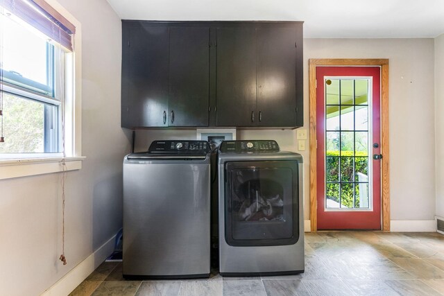 200 Park Ave, New Lexington, OH 43764 - laundry area with cabinet space, washer and dryer, and baseboards