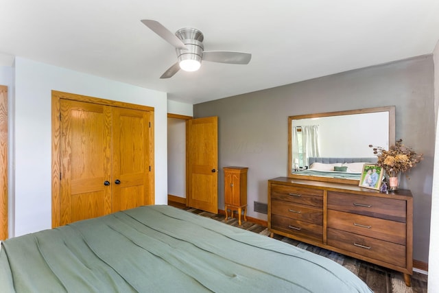 200 Park Ave, New Lexington, OH 43764 - bedroom featuring wood finished floors, a closet, baseboards, and ceiling fan