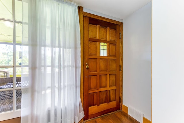 200 Park Ave, New Lexington, OH 43764 - foyer with healthy amount of natural light, dark wood-style flooring, and baseboards