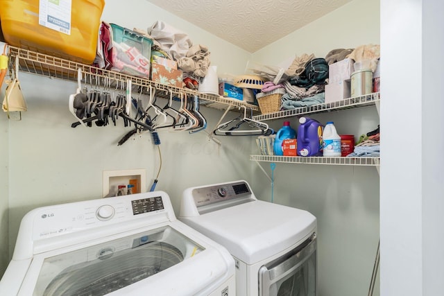 laundry area featuring independent washer and dryer