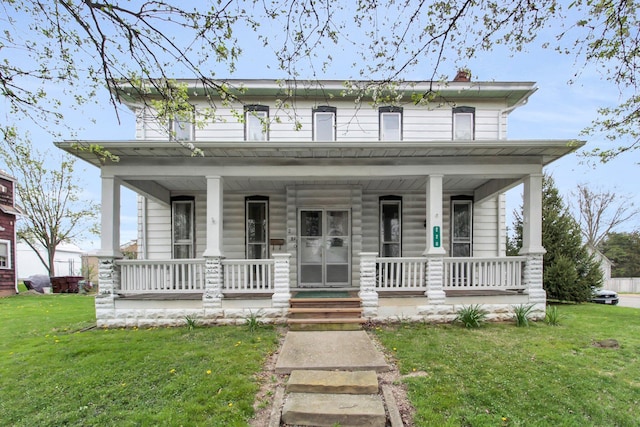 220 E Market St, Baltimore, OH 43105 - view of front of property with a porch, a front yard, and a chimney