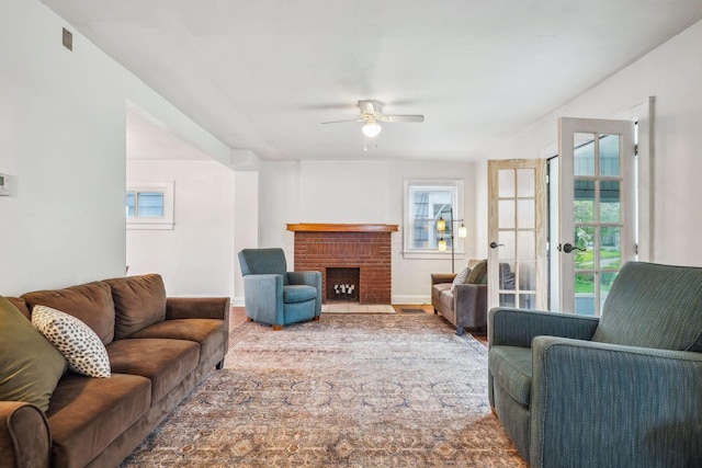 1066 Kelton Ave, Columbus, OH 43206 - living area with a ceiling fan, a fireplace, and baseboards