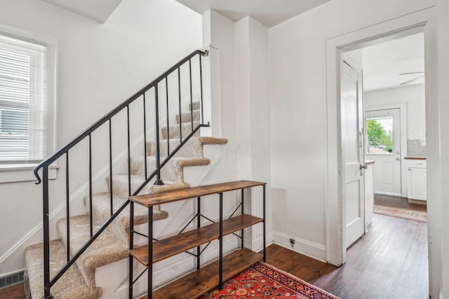 1066 Kelton Ave, Columbus, OH 43206 - stairs with wood finished floors and baseboards