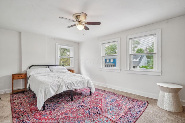 1066 Kelton Ave, Columbus, OH 43206 - bedroom with carpet, baseboards, and a ceiling fan