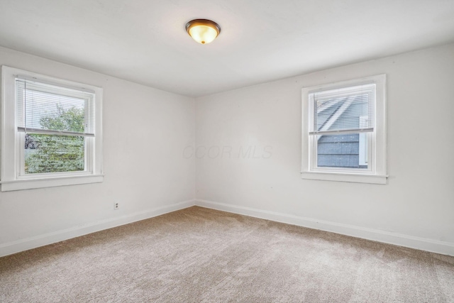 1066 Kelton Ave, Columbus, OH 43206 - empty room featuring carpet and baseboards