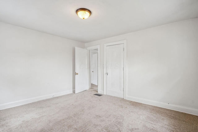 1066 Kelton Ave, Columbus, OH 43206 - empty room featuring carpet flooring and baseboards