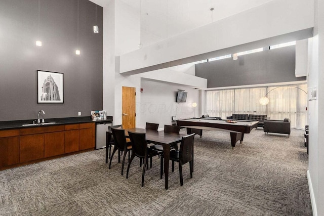 106 N High St Unit 504, Columbus, OH 43215 - carpeted dining room featuring a high ceiling, a sink, and billiards table