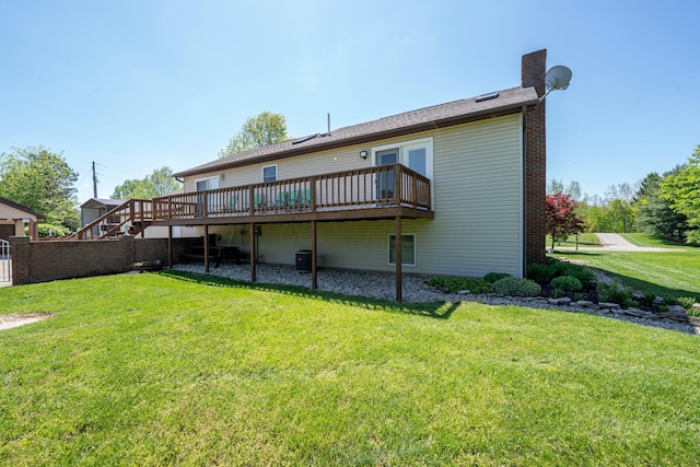 7684 Stout Rd, Circleville, OH 43113 - rear view of property featuring a wooden deck, a chimney, and central AC unit