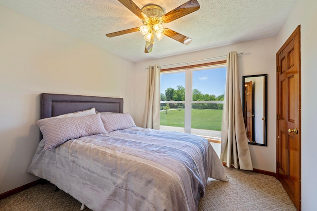 7684 Stout Rd, Circleville, OH 43113 - bedroom with carpet, baseboards, a textured ceiling, and ceiling fan