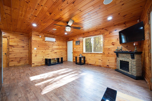 34047 W Buckingham Rd, Logan, OH 43138 - unfurnished living room featuring an outdoor stone fireplace, wood finished floors, ceiling fan, wood walls, and wooden ceiling