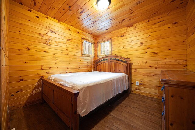 34047 W Buckingham Rd, Logan, OH 43138 - bedroom featuring dark wood-style flooring, wooden ceiling, and wooden walls