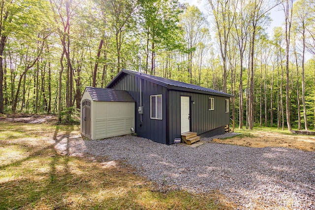 34047 W Buckingham Rd, Logan, OH 43138 - view of shed featuring entry steps and a view of trees