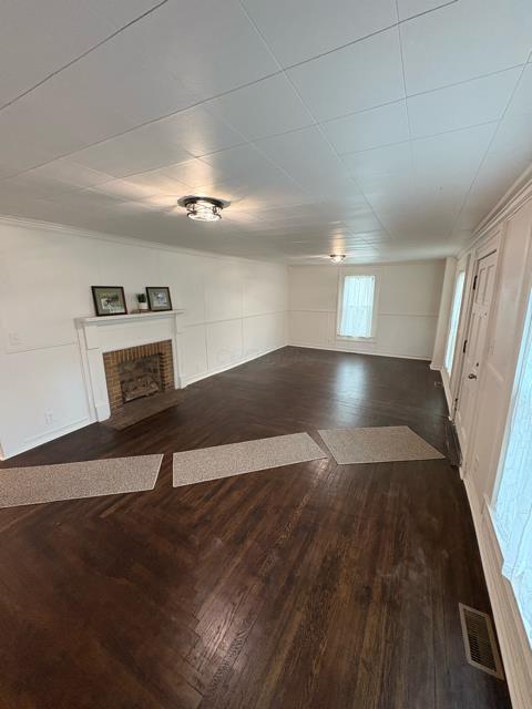 125 College St, Urbana, OH 43078 - basement with a fireplace and wood finished floors