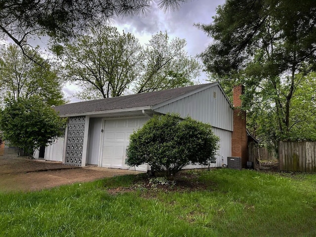 garage featuring fence