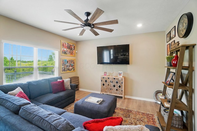 4410 Holstein Dr, Columbus, OH 43207 - living area with a ceiling fan, wood finished floors, baseboards, and recessed lighting