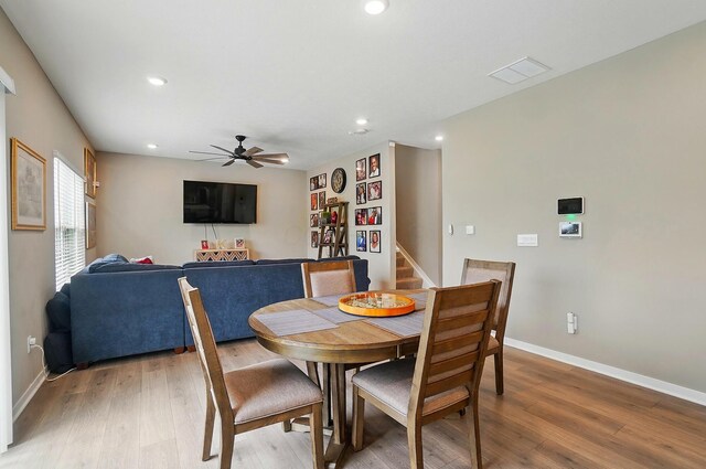 4410 Holstein Dr, Columbus, OH 43207 - dining room featuring stairway, wood finished floors, recessed lighting, a ceiling fan, and baseboards