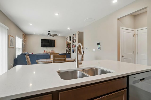 4410 Holstein Dr, Columbus, OH 43207 - kitchen with a sink, dishwasher, ceiling fan, recessed lighting, and open floor plan