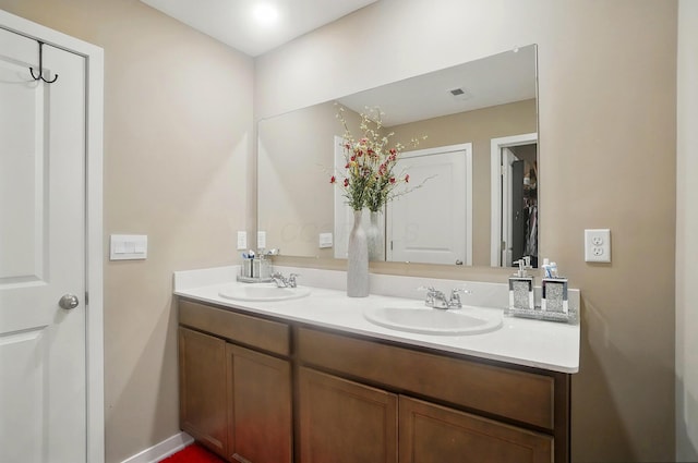 4410 Holstein Dr, Columbus, OH 43207 - bathroom featuring double vanity