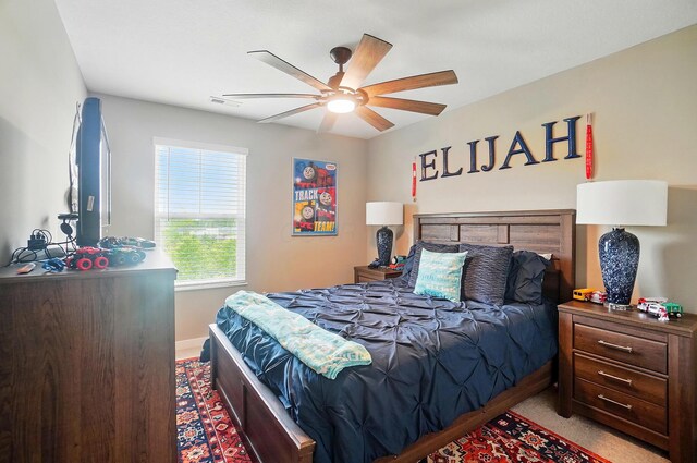 4410 Holstein Dr, Columbus, OH 43207 - bedroom with baseboards and a ceiling fan