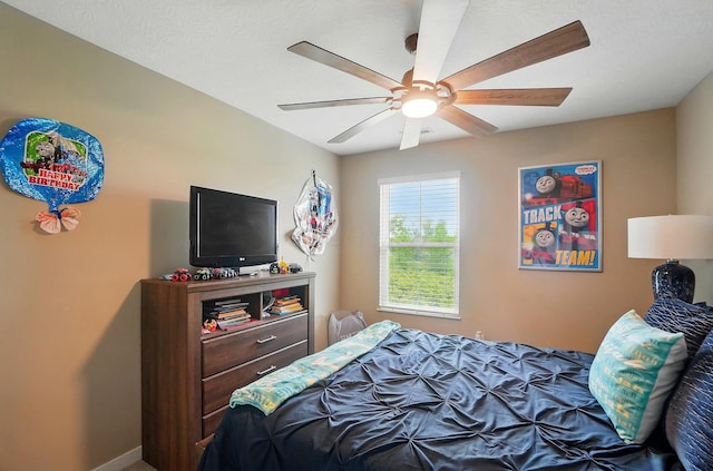 4410 Holstein Dr, Columbus, OH 43207 - bedroom with ceiling fan and baseboards