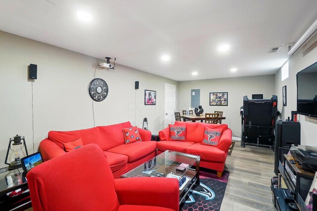 4410 Holstein Dr, Columbus, OH 43207 - living area featuring wood finished floors and recessed lighting