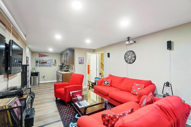 4410 Holstein Dr, Columbus, OH 43207 - living area with light wood-type flooring, recessed lighting, and baseboards
