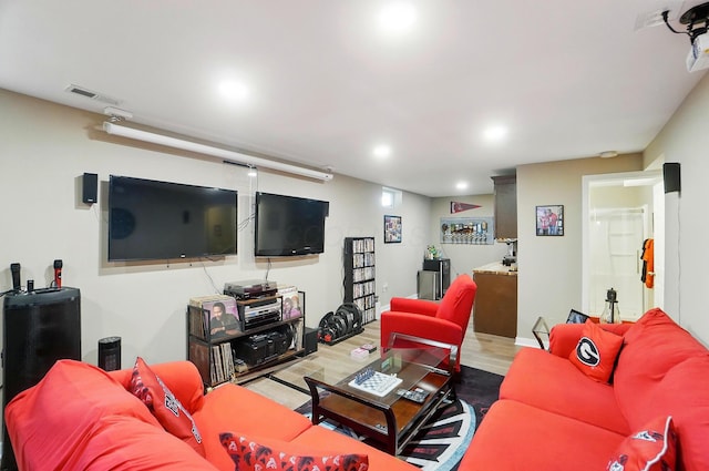 4410 Holstein Dr, Columbus, OH 43207 - living area with wood finished floors and recessed lighting
