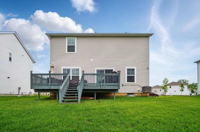 4410 Holstein Dr, Columbus, OH 43207 - back of house with a deck, a yard, and cooling unit
