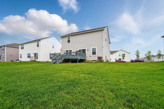 4410 Holstein Dr, Columbus, OH 43207 - back of property featuring a deck, a yard, and central AC unit