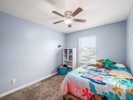 592 Summer Tree Loop, Marysville, OH 43040 - bedroom featuring carpet flooring, baseboards, and ceiling fan