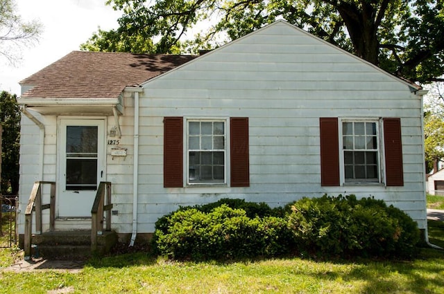 1275 Briarwood Ave, Columbus, OH 43211 - view of front facade featuring roof with shingles