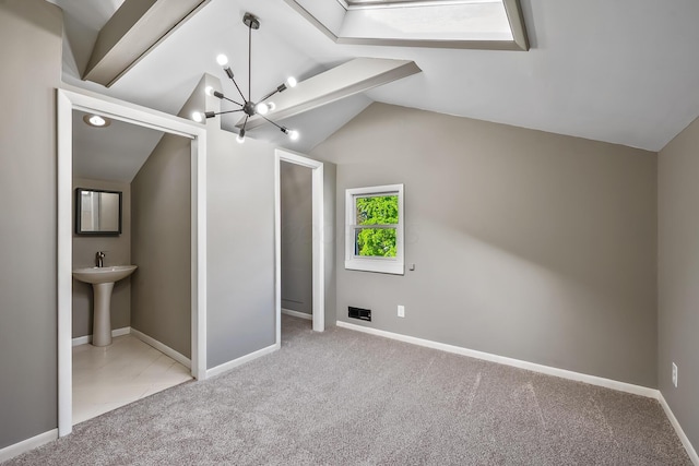 229 Pennsylvania Ave, Marion, OH 43302 - unfurnished bedroom with vaulted ceiling, carpet flooring, baseboards, a chandelier, and a sink