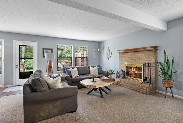 5524 Rushden Dr, Columbus, OH 43230 - carpeted living room with plenty of natural light, a fireplace, and a textured ceiling