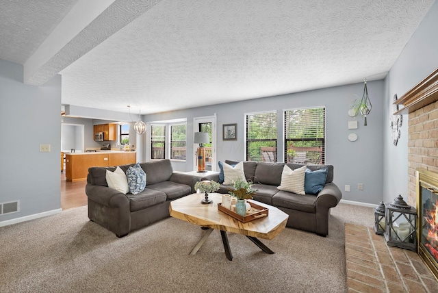 5524 Rushden Dr, Columbus, OH 43230 - carpeted living room with a fireplace and a textured ceiling