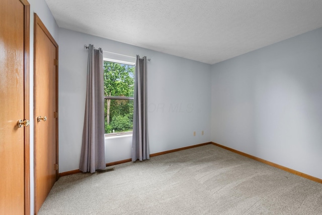 5524 Rushden Dr, Columbus, OH 43230 - spare room with light carpet and a textured ceiling