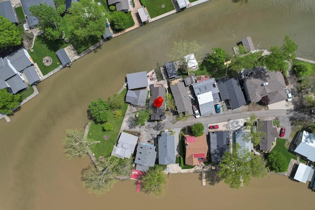 aerial overview of property's location with nearby suburban area