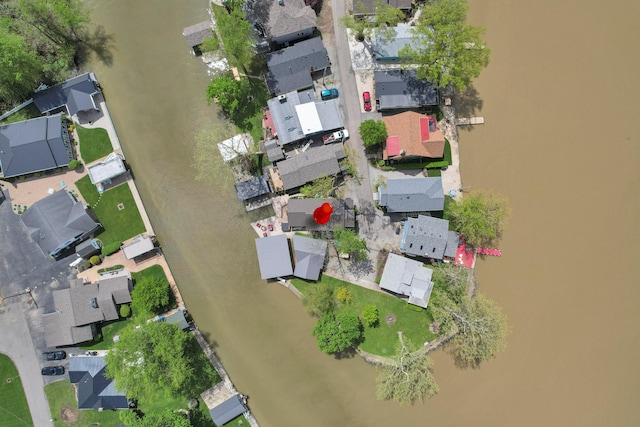 aerial view of property's location with nearby suburban area