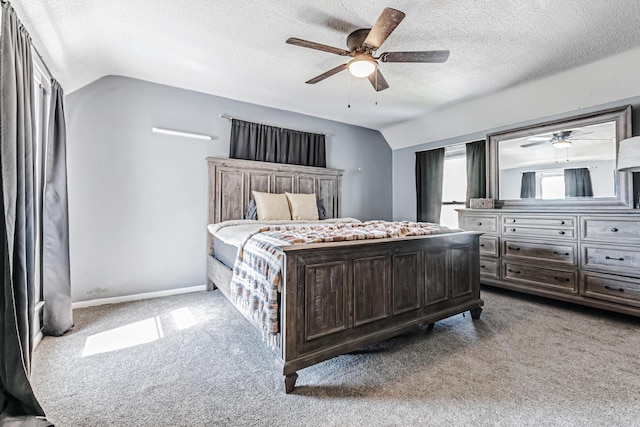 76 Resch St, Kenton, OH 43326 - carpeted bedroom featuring lofted ceiling, a textured ceiling, ceiling fan, and baseboards