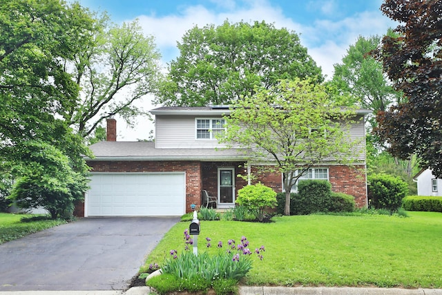 1262 Pepperell Dr, Columbus, OH 43235 - view of front of house featuring a front yard, roof mounted solar panels, driveway, and brick siding