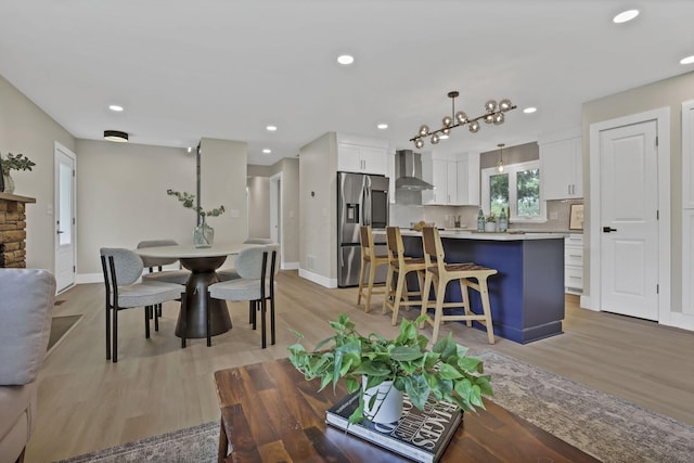 2095 Mccoy Rd, Upper Arlington, OH 43220 - dining space featuring light wood-style floors, baseboards, and recessed lighting