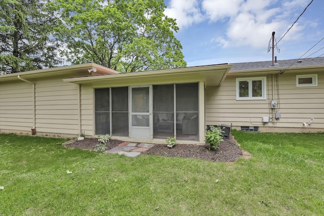 2095 Mccoy Rd, Upper Arlington, OH 43220 - rear view of property featuring a sunroom and a yard