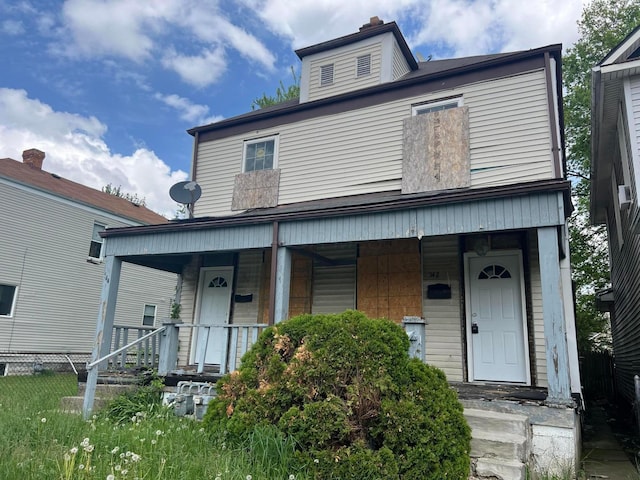 542-544 Trevitt St, Columbus, OH 43203 - view of front of property with a porch and fence