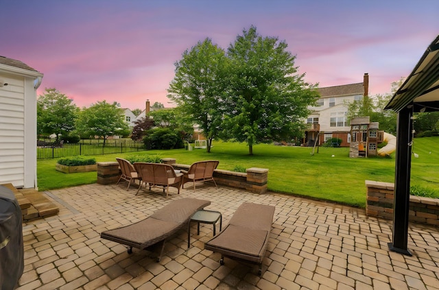 5073 Thornwood Dr, Westerville, OH 43082 - patio terrace at dusk featuring a patio and a playground