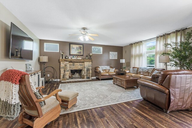 5073 Thornwood Dr, Westerville, OH 43082 - living room with wood finished floors, a ceiling fan, and a fireplace