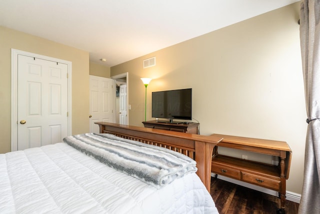 5073 Thornwood Dr, Westerville, OH 43082 - bedroom with dark wood-style flooring and baseboards